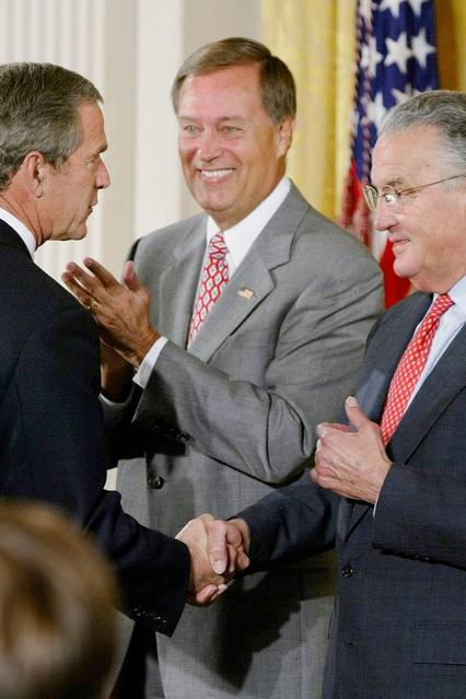 President George W. Bush with the co-sponsors of the Sarbanes-Oxley Act, Sen. Paul Sarbanes (right) and Rep. Mike Oxley, in 2002.